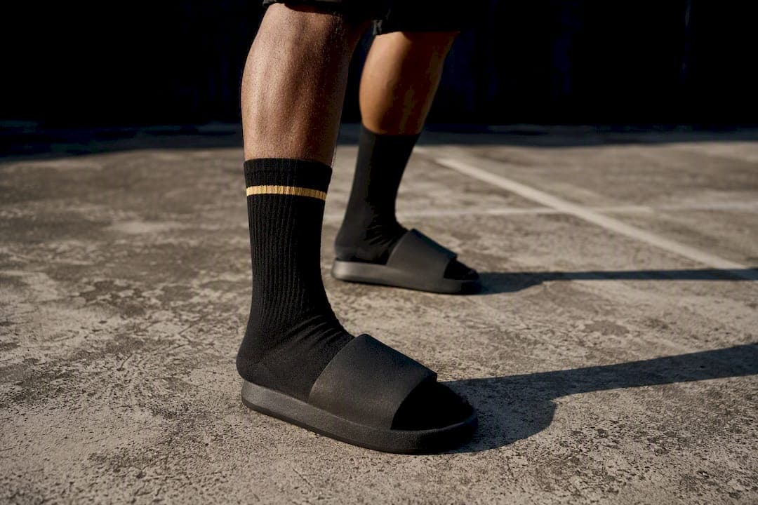 Make Slides With Socks a Confident Streetwear Move: 7 Outfits to Copy
